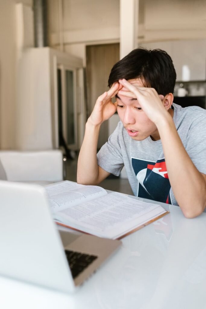 Anxious person thinking at a desk